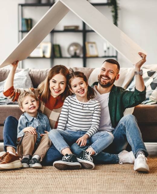 concept housing a young family. mother father and children in new home concept housing a young family. mother father and children in a new home